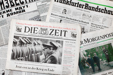 Collage von deutschen und russischen Zeitungsschlagzeilen vom Ende August 1994